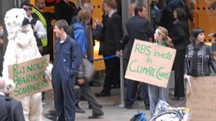 Vericola's CEO Rebecca Todd (far right holding placard) at an Rising Tide action.
